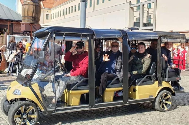 City Tour Cracow golf car plus Cruise on the Vistula River. - Across Father Bernatek’s Bridge to Podgórze