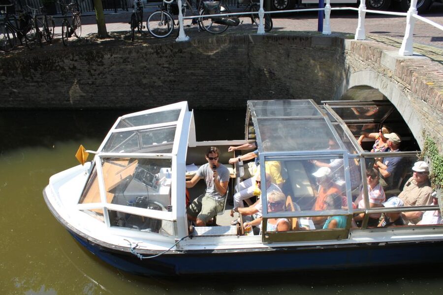 Delft: Canal Cruise with Guided Commentary - Commentary on Vermeer, Delft Blue, and Dutch power