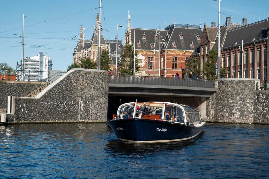 Discover Amsterdam: Luxury Canal Cruise with a Local Skipper - Live commentary and the audio guide