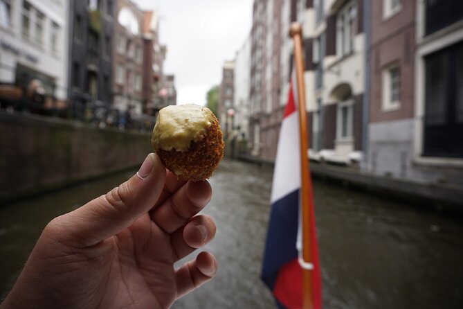 Eating Amsterdam: Food Tour & Canals Cruise - Surinamese roti adds a wider view