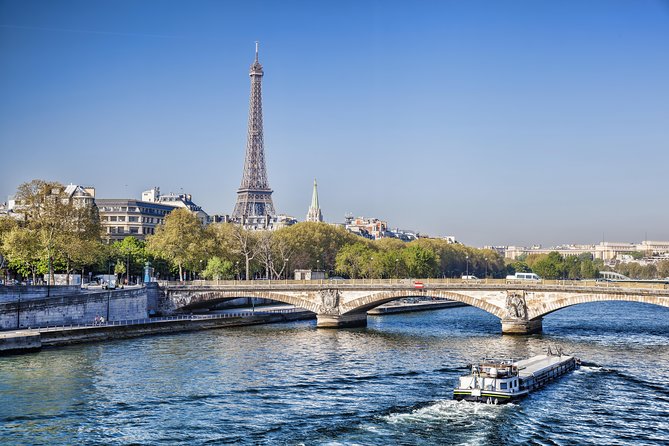 Eiffel Tower Summit Option with Seine River Cruise and City Tour - Second floor views, then the summit