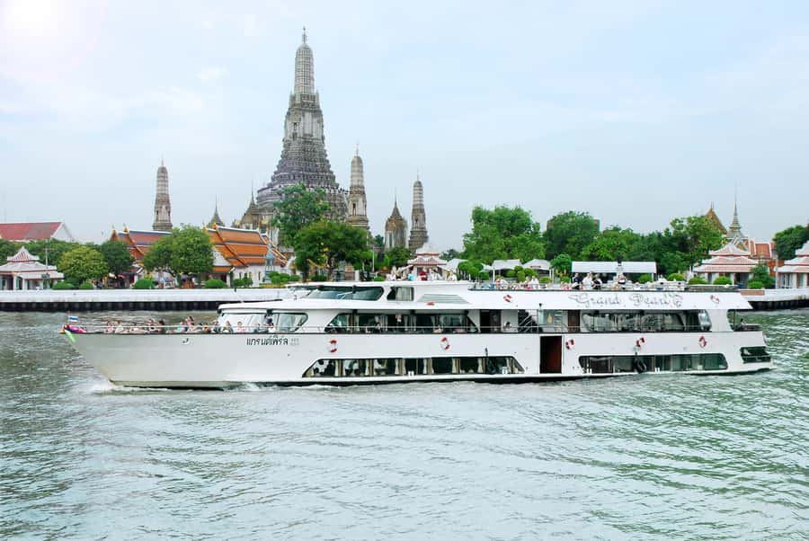 From Bangkok: Ayutthaya Day Tour by Bus with River Cruise - Wat Mahathat and the Buddha head in the tree