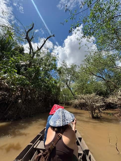 From Ho Chi Minh: Cai Be Boat & Bike Mekong Delta Experience - The sampan ride through shaded canals