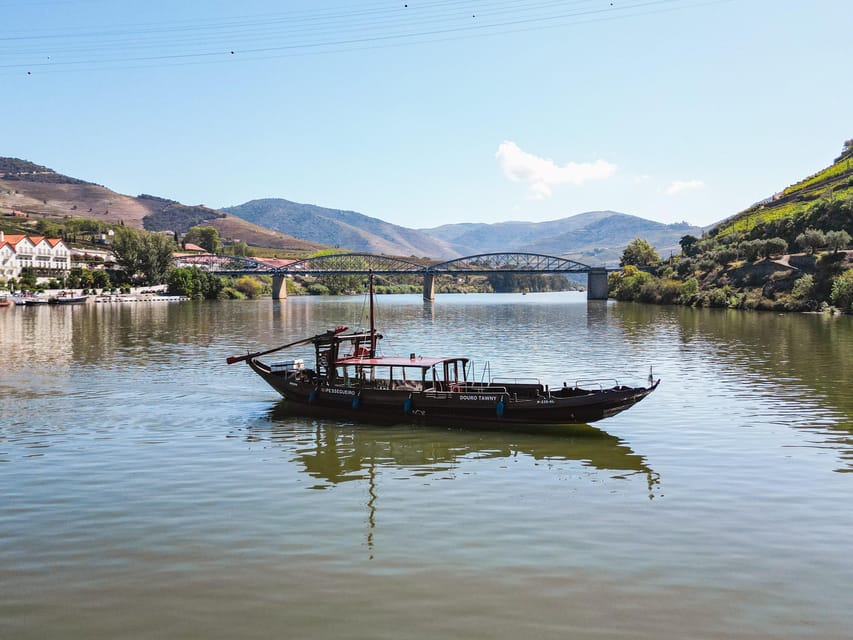 From Pinhão: Private Rabelo Boat Douro Tour with Port Wine - Quinta do Bomfim and the first vineyard views