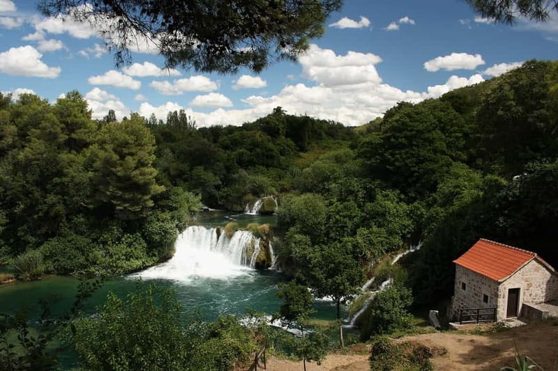 From Split: Krka Waterfalls with Riverboat Ride & swimm stop - Why the Krka boat approach matters