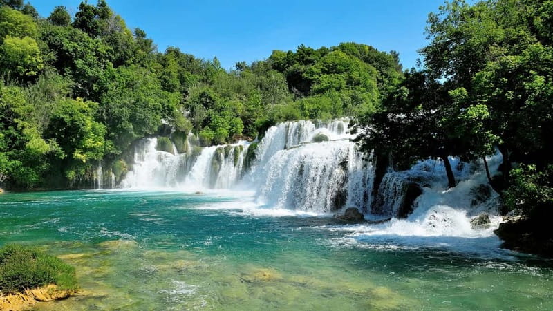 From Split: Krka Waterfalls with Riverboat Ride & swimm stop - Leaving Split on an 80-minute bus ride