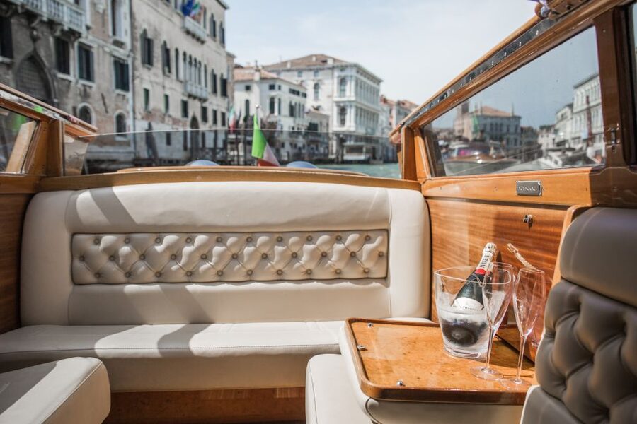 Grand Canal Boat Tour & Murano - Stories along the smaller canals