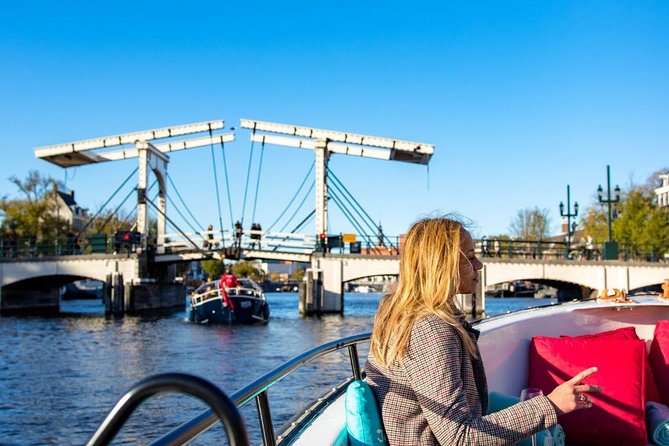 Guided Amsterdam Canal Cruise – Snacks & Drinks on board(1 Hour) - Oude Kerk and a quiet pocket of the Red Light District