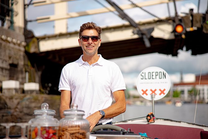Guided Amsterdam Canal Cruise – Snacks & Drinks on board(1 Hour) - NEMO and the view from the water