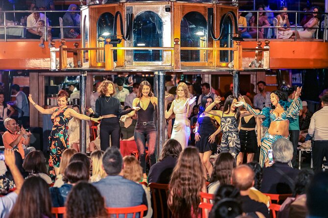 Istanbul Bosphorus Dinner Cruise: Live Folk Dance & DJ Experience - Bridges, fortresses, and Ottoman waterfront views
