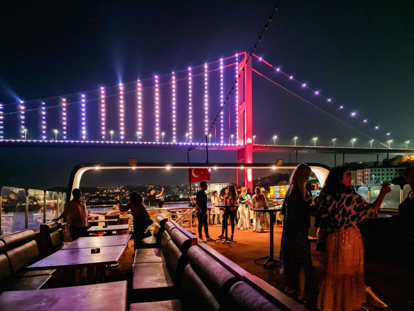 Istanbul: Bosphorus Dinner Cruise w/ Drinks & Entertainment - The Bosphorus after dark, with Istanbul on both sides