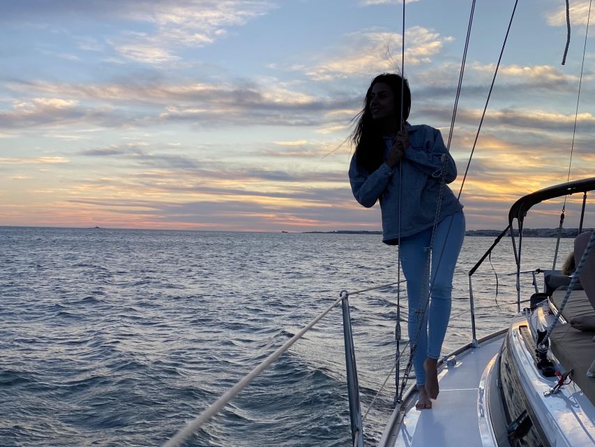 Lisbon: Private Tagus River Sunset Cruise on a Luxury Boat - Lisbon’s hills, Bairro Alto, and Alfama
