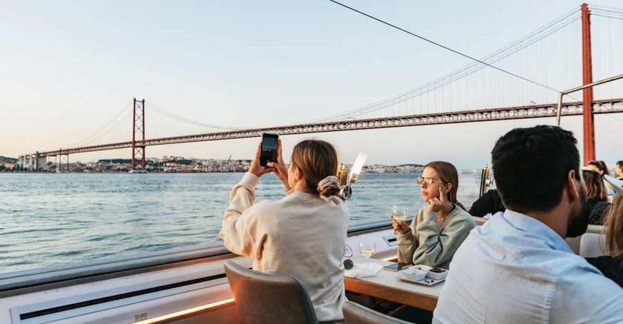 Lisbon: Sunset Cruise with Welcome Drink and Snacks - Music, commentary, and the overall mood