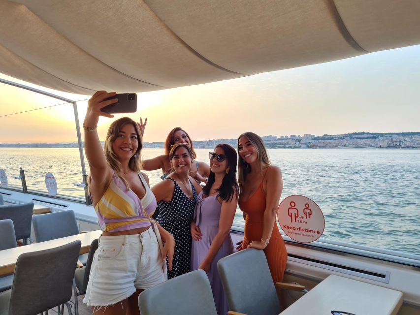 Lisbon: Sunset Cruise with Welcome Drink and Snacks - The boat, seating, and sunset comfort