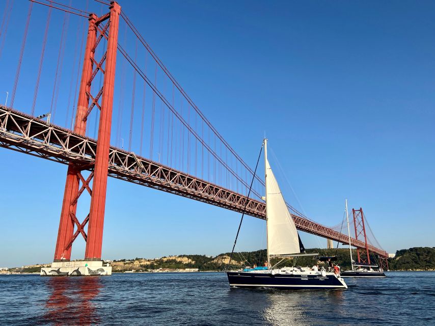 Lisbon: Tagus River Sunset Cruise with Drinks - The 25 de Abril Bridge at sunset