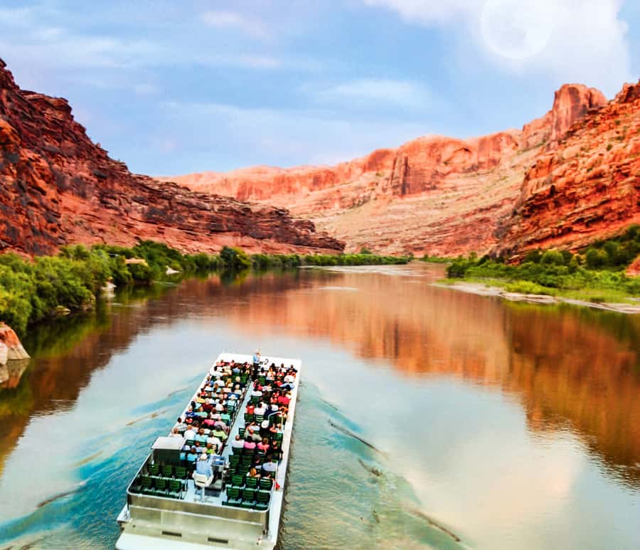 Moab: Colorado River Dinner Cruise with Music and Light Show - Sunset colors before the lights come on