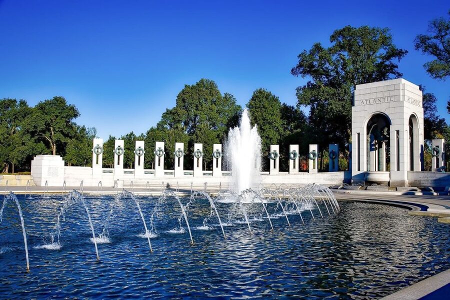 National Mall Tour with 10+ Stops, Boat Cruise, Entry Tickets - Crossing into Virginia for military memorials