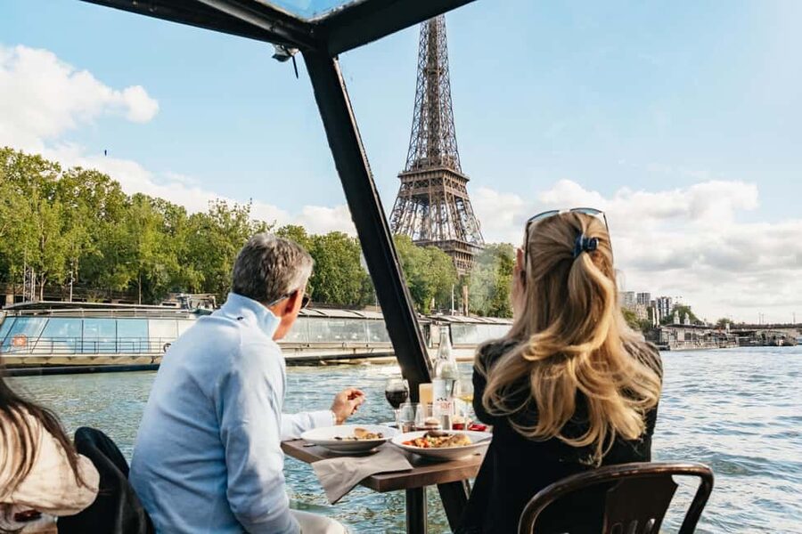 Paris : 3-Course Gourmet Dinner Cruise on Seine River - What passes outside the glass windows