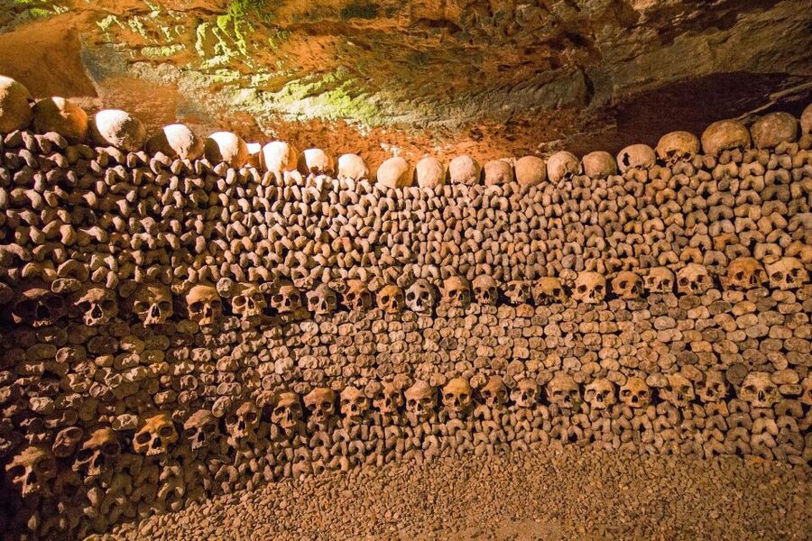 Paris: Catacombs Entry & Seine River Cruise with Audio Guide - Walking beneath Paris in the Catacombs
