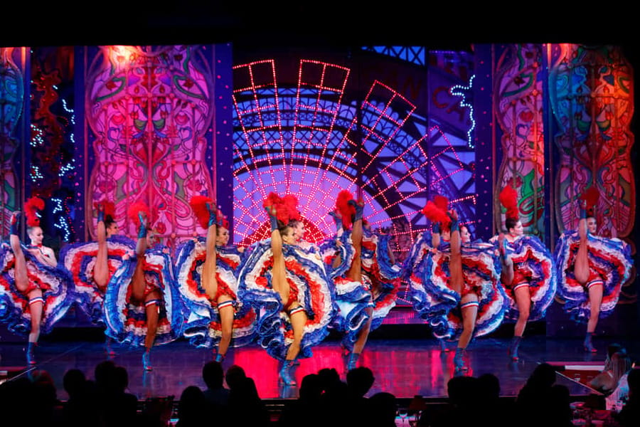 Paris: First Show Moulin Rouge with Champagne & Seine Cruise - The coach ride to Montmartre