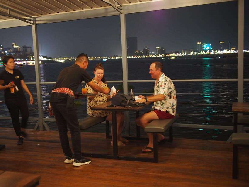 Phnom Penh: Mekong Sunset Dinner Cruise with Live Music - Drinks, cocktails, and the value of $9