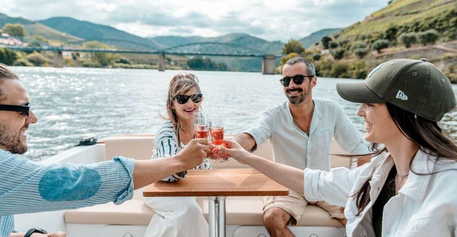 Pinhão: Douro River Solar Boat Tour with Wine Tasting - Two Adega de Favaios wines, with grape juice for non-drinkers
