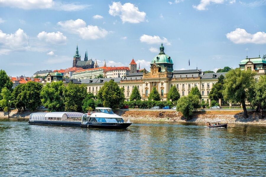 Prague: Evening Vltava River Eco Cruise with Prosecco - Looking up at Charles Bridge from below