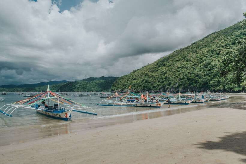 Puerto Princesa: Underground River, Zipline, Paddleboat Tour - A quiet paddleboat ride through the mangroves