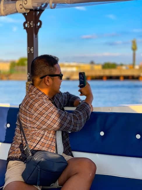 Riga: Canal Boat Sightseeing Tour With Audio guide - Central Market, railway bridges, and the Daugava
