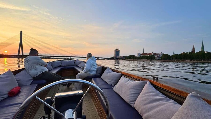 Riga: Canal Boat Tour with Welcome Drink & Audio Guide - Riga Central Market from the water