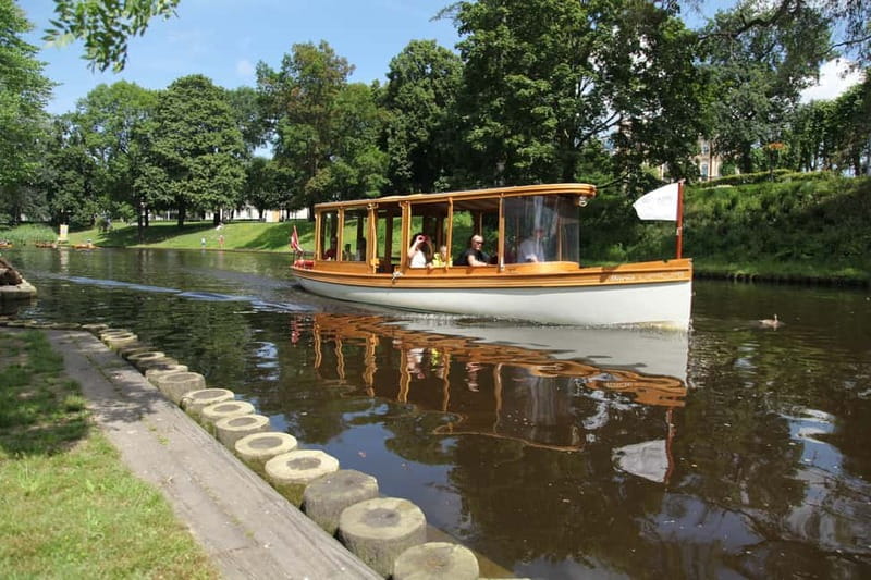 Riga: Canal & Daugava Cruise on a Historic Wooden Boat - Central Market and the first change of scenery