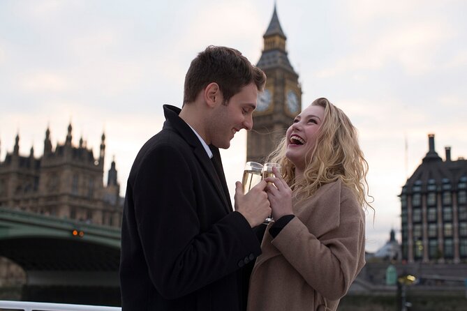 River Thames Evening Cruise with Sparkling wine and Canapés - HMS Belfast, Canary Wharf, and the return