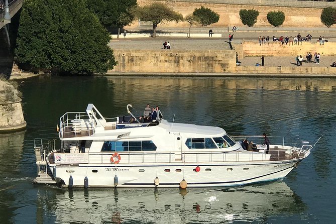 Seville: Cruise along the Guadalquivir River with appetizer - The snack and drink are part of the value