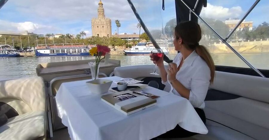 Seville: Exclusive River Boat Tour with Tapas - La Cartuja and the modern side of Seville