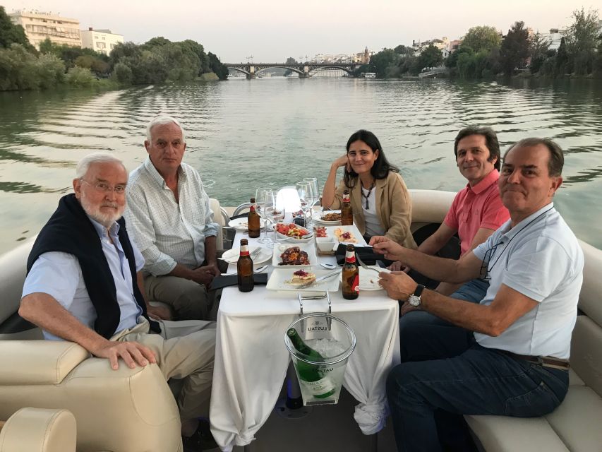 Seville: Exclusive River Boat Tour with Tapas - Triana Bridge and the old center