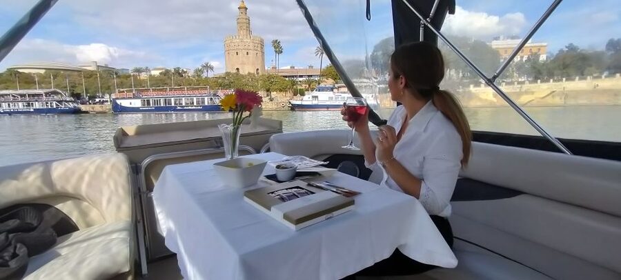 Seville: Exclusive River Boat Tour with Tapas - Seville’s landmarks from the water