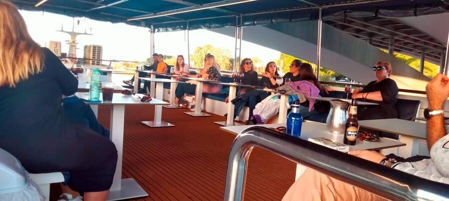 Seville: Guadalquivir Boat Tour with Optional Lunch/Dinner - Music, seating, and the feel on board