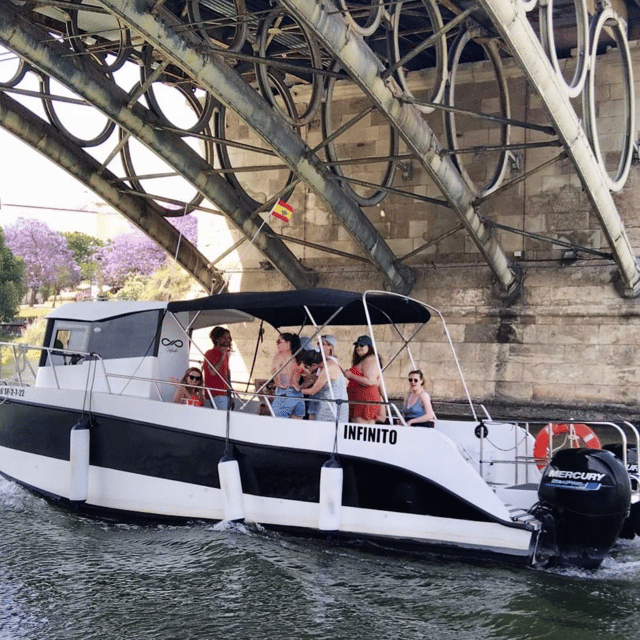 Seville: Guadalquivir River Boat Tour - Daylight, evening light, and the included drink