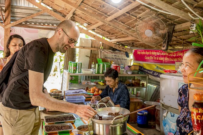 Small-Group Mekong Delta Day Trip: Boat Ride, Cottages & Pagoda - Gardens, village paths, and the bicycle choice