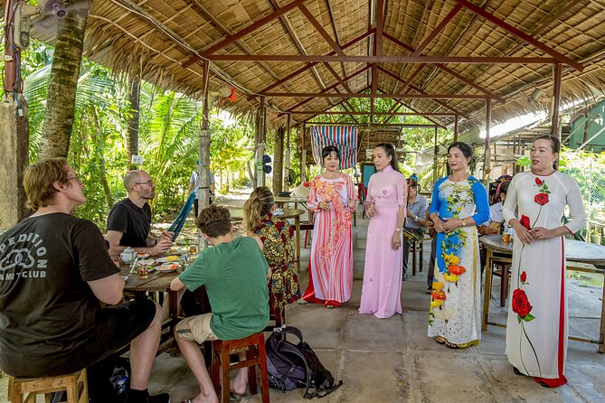 Small-Group Mekong Delta Day Trip: Boat Ride, Cottages & Pagoda - The hand-rowed boat through the coconut canals