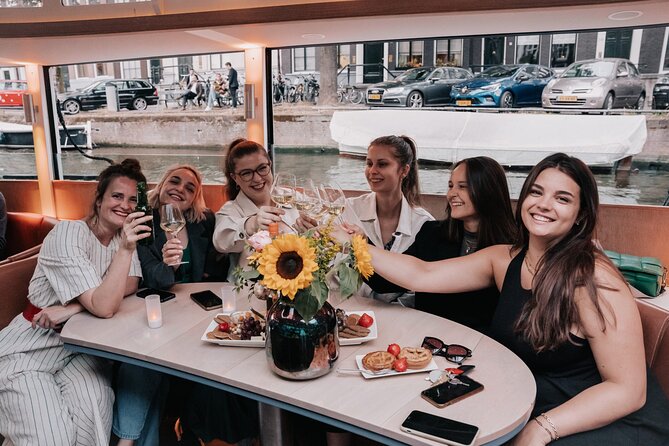 The Ultimate Amsterdam Canal Cruise - 2hr - Small Group with Drinks & Snacks - The boat, seating, and atmosphere