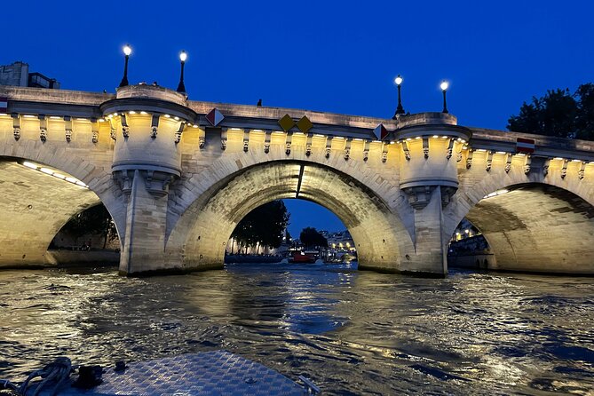 Top Private Cruises in Paris with French Champagne and surprises - The Louvre, Pont Neuf, and Notre-Dame